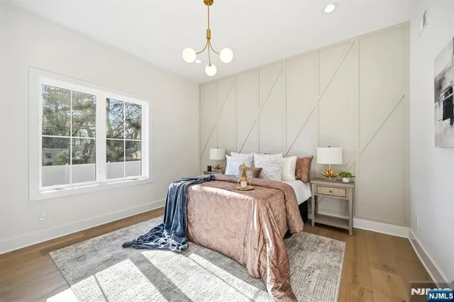 a bed room with a bed and a window