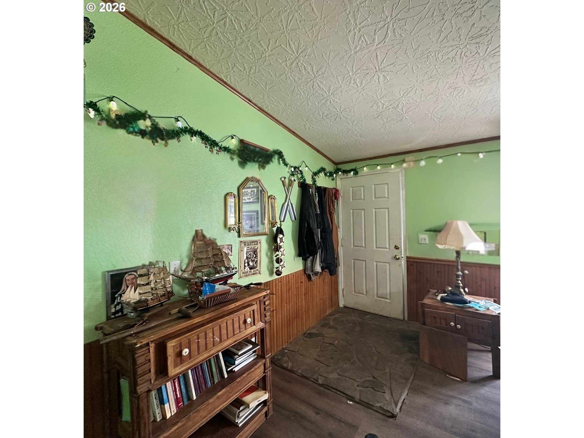 4821 Northeast 50th Street Neotsu, OR 97364 - Photo 4 of 19 a view of hallway with furniture