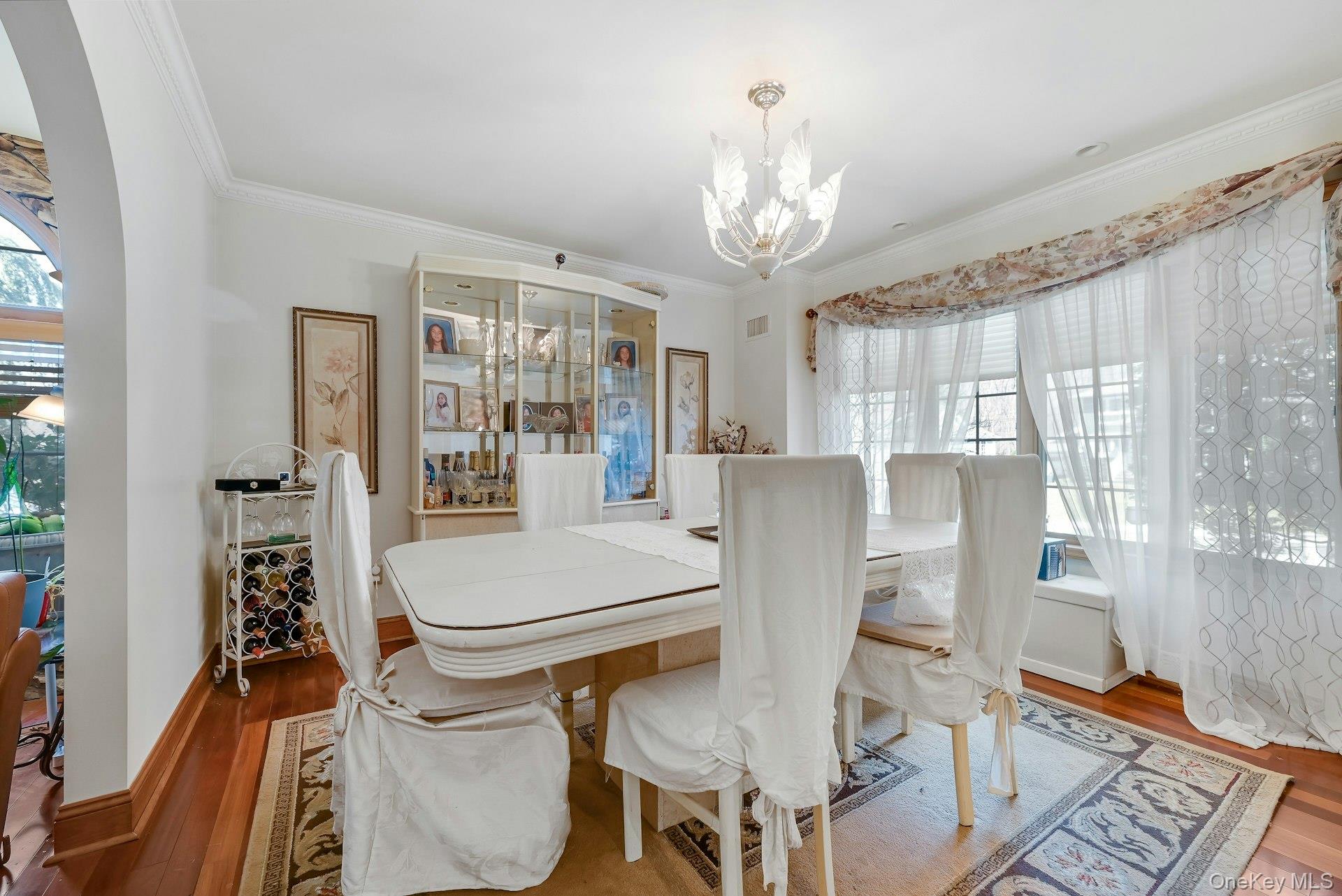 236 Valley Road Valley Cottage, NY 10989 - Photo 14 of 35 a view of a dining room with furniture and chandelier