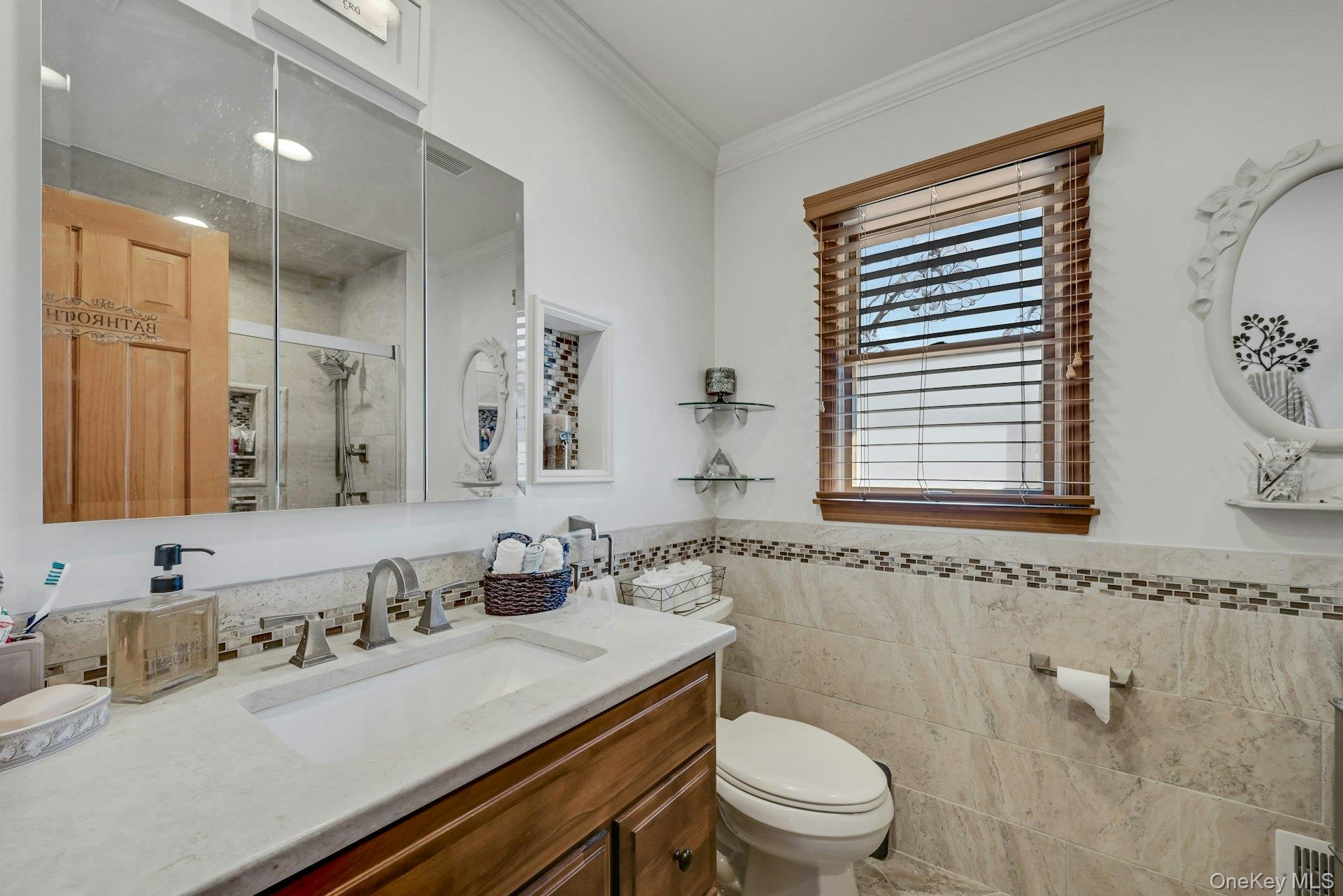 236 Valley Road Valley Cottage, NY 10989 - Photo 18 of 35 a bathroom with a granite countertop sink toilet a large mirror and shower