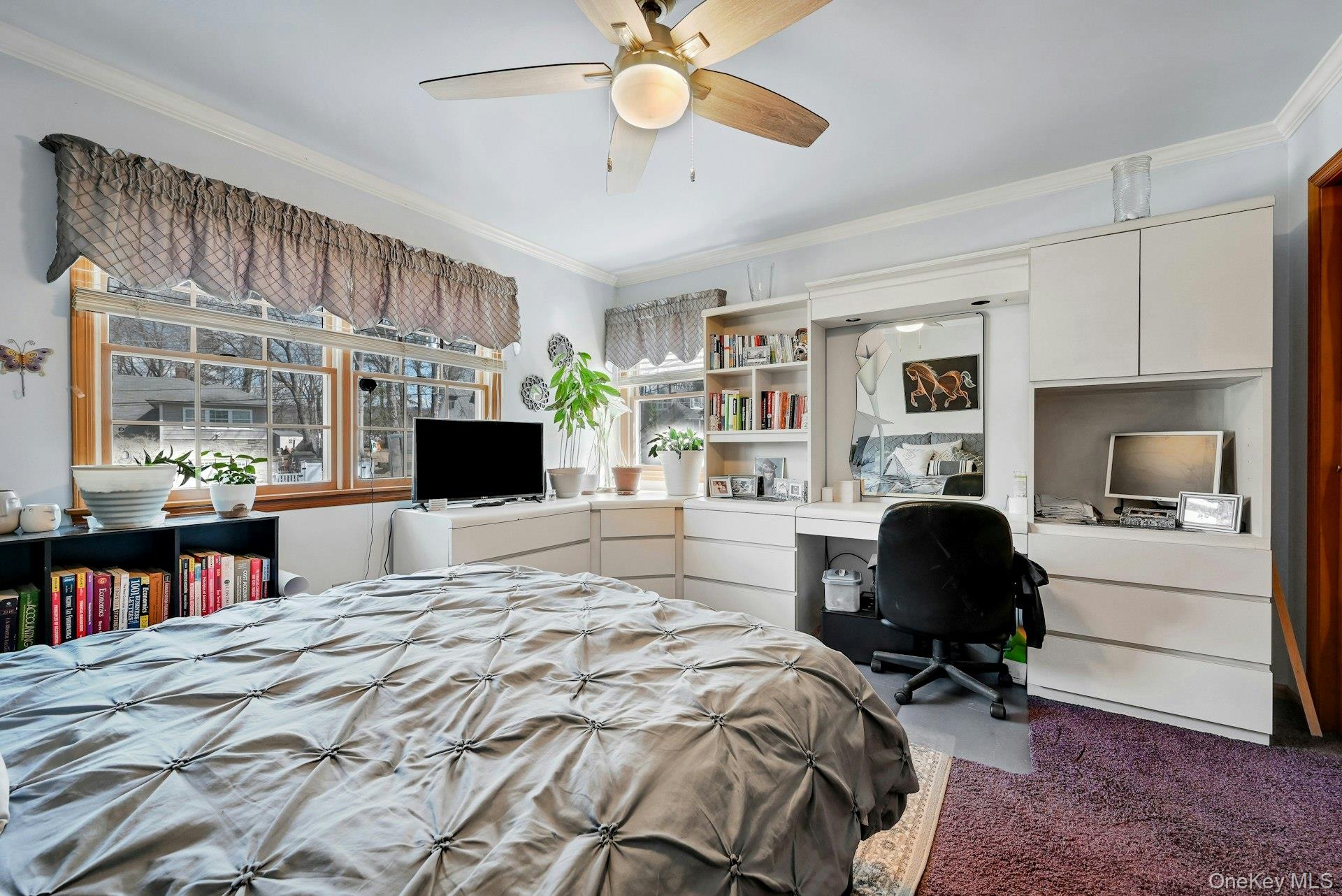 236 Valley Road Valley Cottage, NY 10989 - Photo 19 of 35 a bedroom with a bed and a chandelier