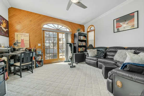 a bathroom with a double vanity sink toilet and shower