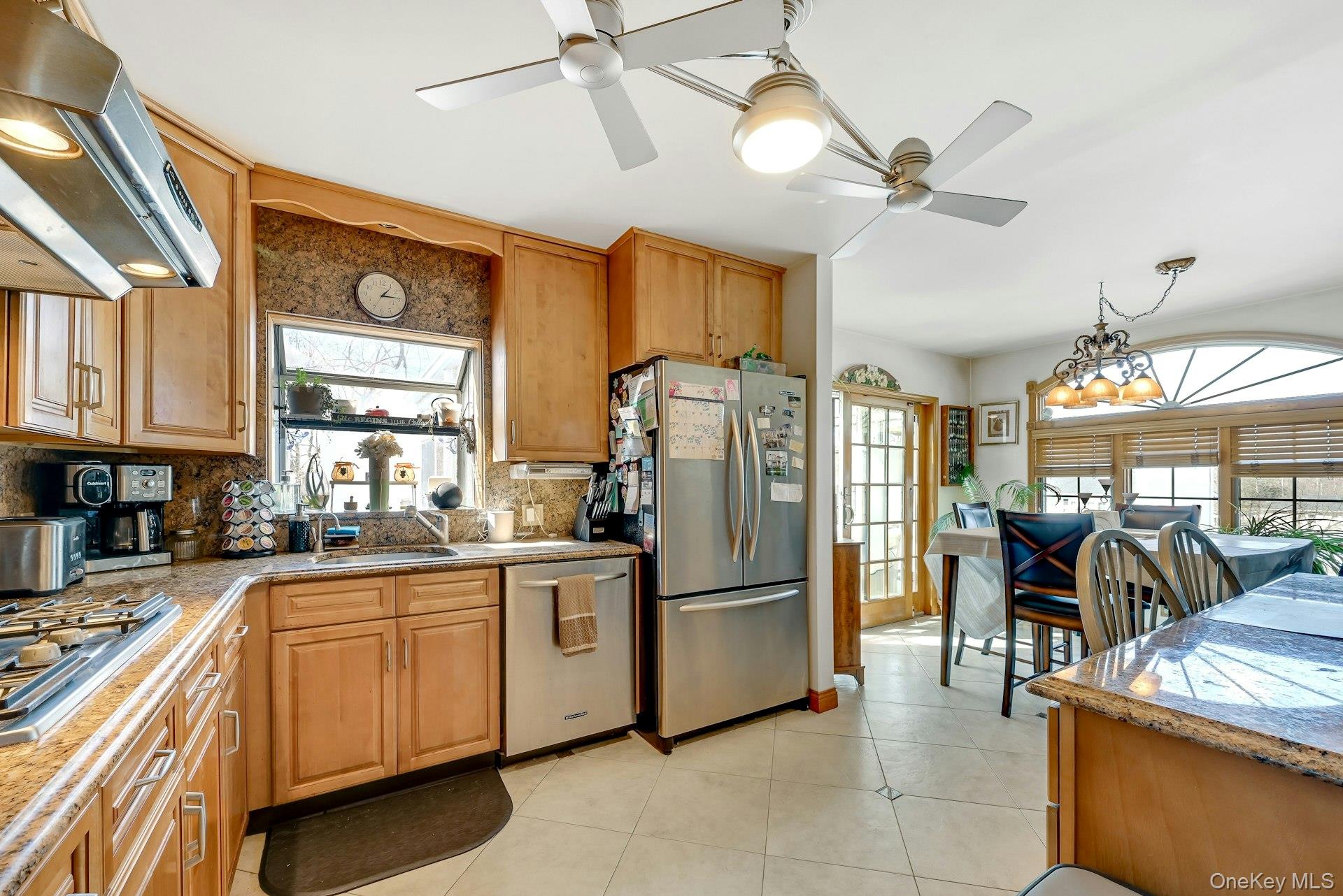 236 Valley Road Valley Cottage, NY 10989 - Photo 3 of 35 a kitchen with stainless steel appliances granite countertop a refrigerator and a sink
