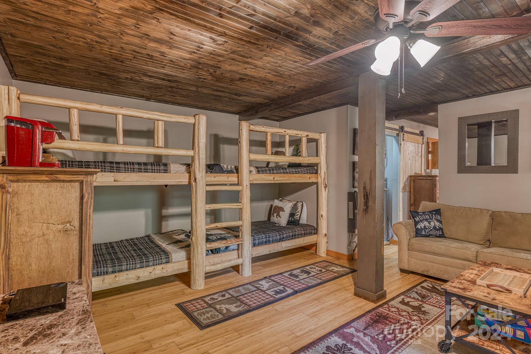 274 Hemlock Road Banner Elk, NC 28604 - Photo 34 of 46 a living room with furniture and a rug