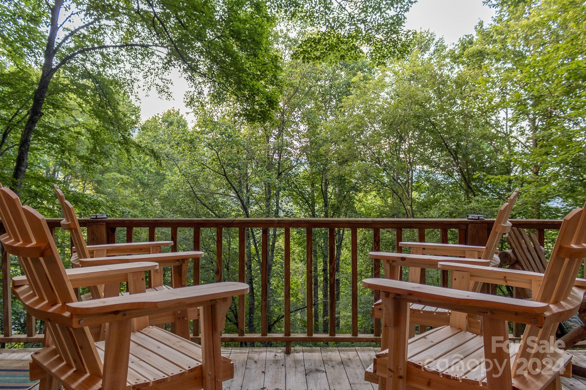 274 Hemlock Road Banner Elk, NC 28604 - Photo 41 of 46 a view of a balcony with chairs