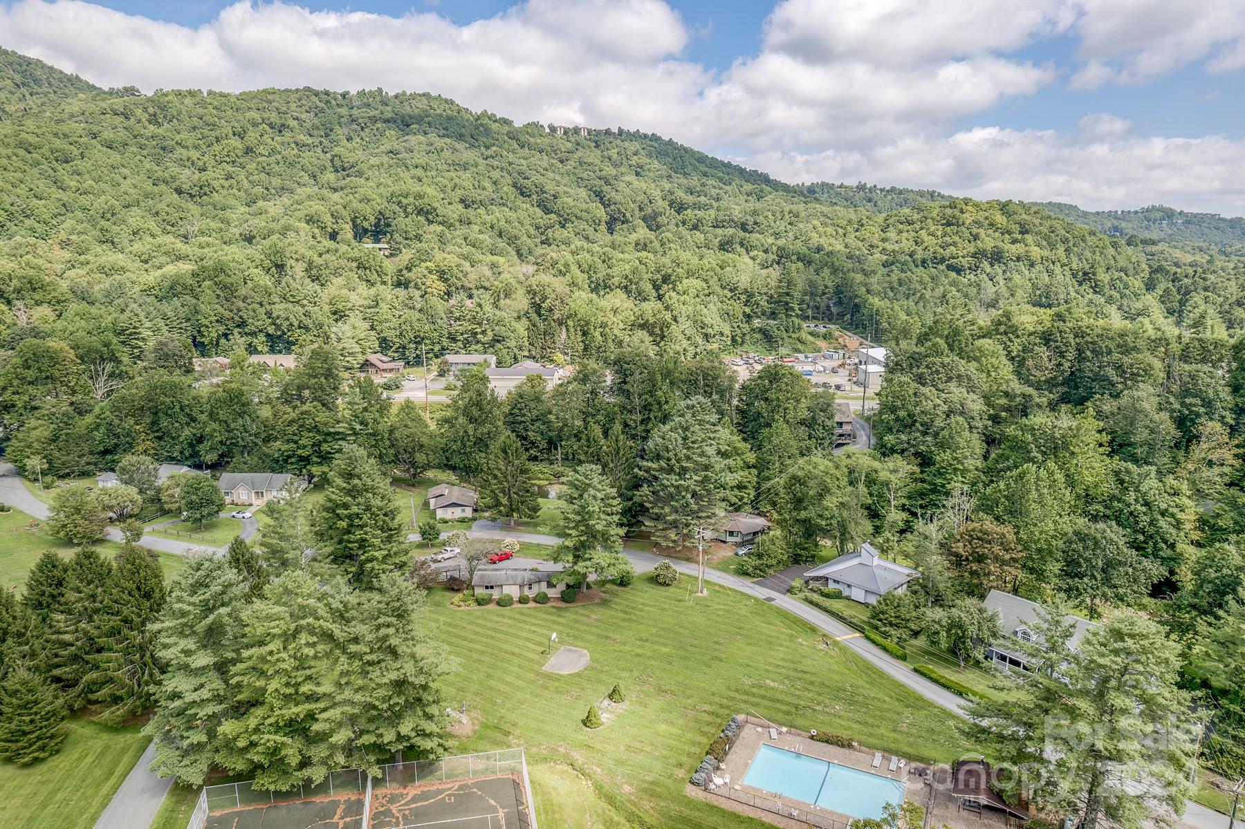274 Hemlock Road Banner Elk, NC 28604 - Photo 45 of 46 an aerial view of residential houses with outdoor space and trees