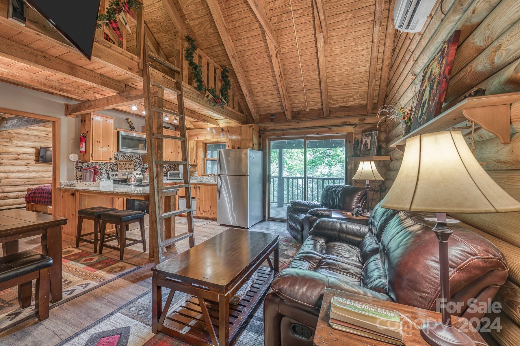 274 Hemlock Road Banner Elk, NC 28604 - Photo 6 of 46 a living room with furniture