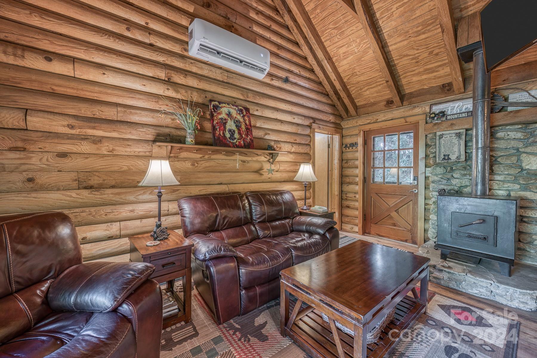 274 Hemlock Road Banner Elk, NC 28604 - Photo 8 of 46 a living room with furniture