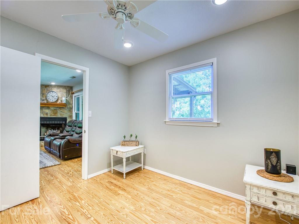 685 Osborne Road Clyde, NC 28721 - Photo 30 of 30 a view of a bedroom with workspace and a window