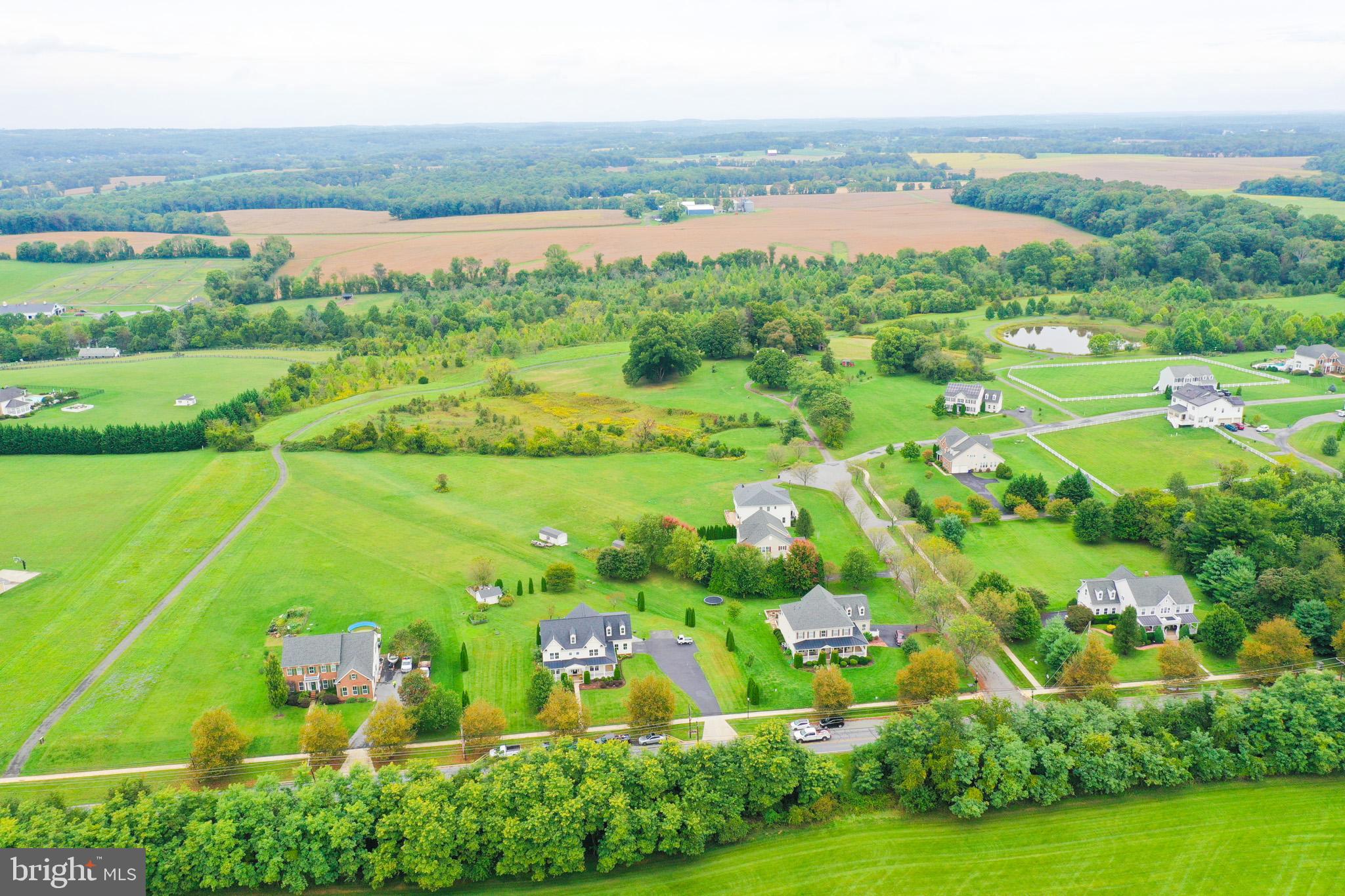 7321 Brink Road Laytonsville, MD 20882 - Photo 39 of 55 an aerial view of tennis court
