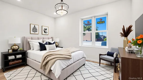 a bedroom with a bed and a couch