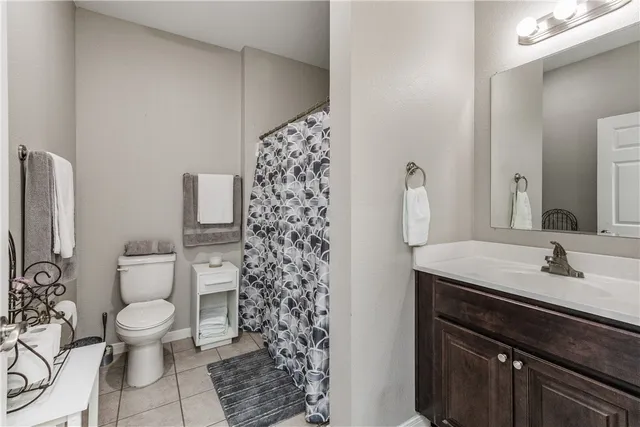 a bedroom with furniture and flat screen tv