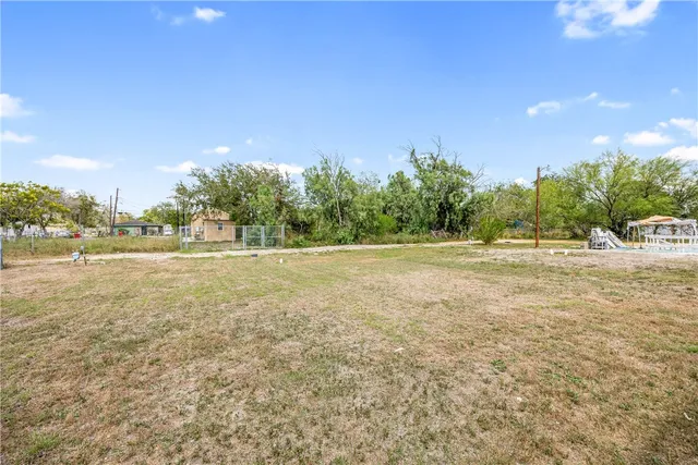 a view of balcony with wooden floor