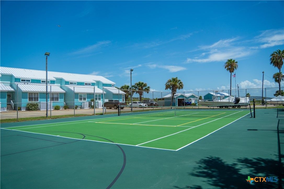 2292 North Fulton Beach Road, Unit 505 Rockport, TX 78382 - Photo 43 of 46 a view of a tennis court