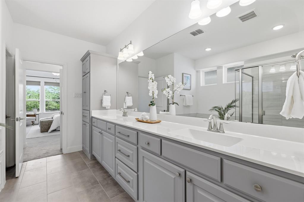 539 Farrell Lane Allen, TX 75013 - Photo 26 of 39 Spacious bathroom featuring a dual vanity with light gray cabinetry, white countertops, and a full-width mirror