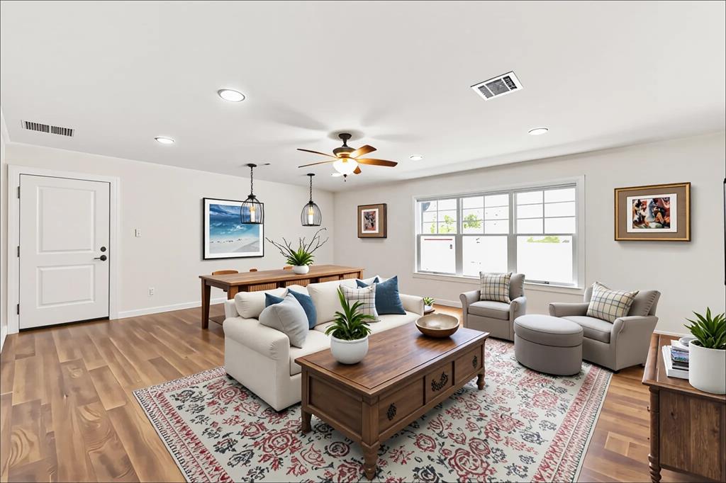 583 County Rd NW 1010 Road Northwest Mount Vernon, TX 75457 - Photo 11 of 40 a living room with furniture and wooden floor