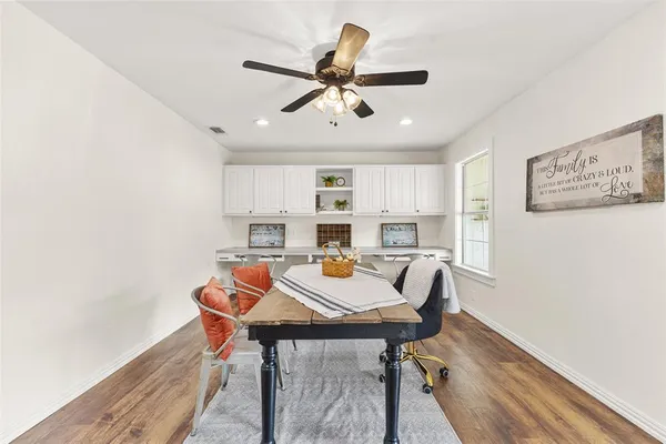 a view of a dining room with furniture