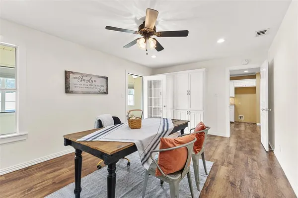 a view of a livingroom with furniture and wooden floor