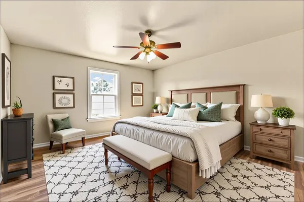 a bedroom with a bed and a window