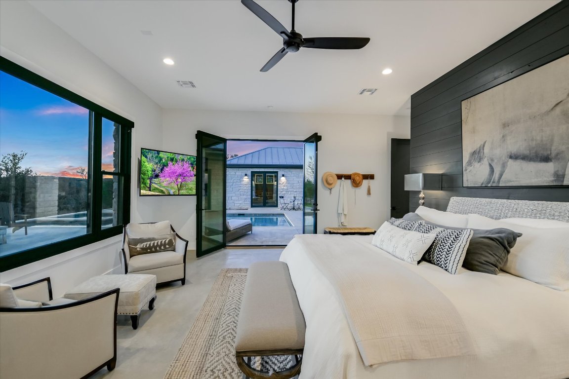 343 Pug Rippy Dripping Springs, TX 78620 - Photo 17 of 40 Primary Suite w/exit to pool