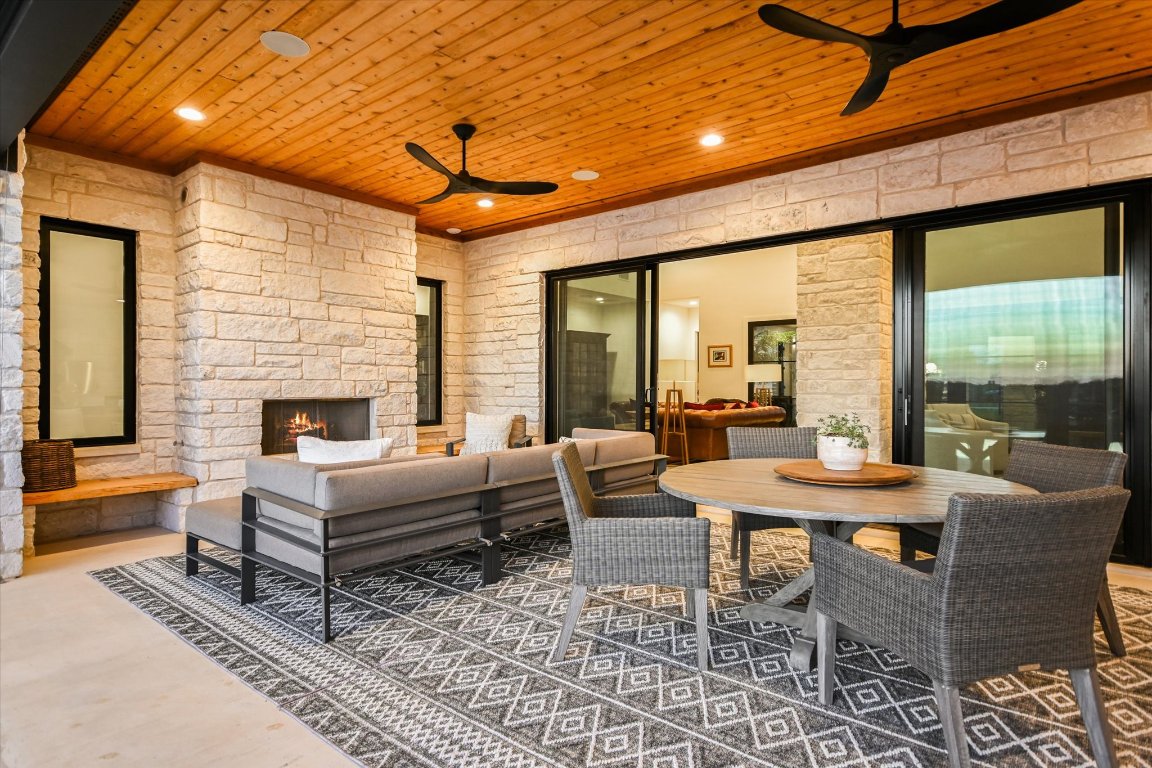343 Pug Rippy Dripping Springs, TX 78620 - Photo 10 of 40 Covered Outdoor Lanai w/outdoor fireplace