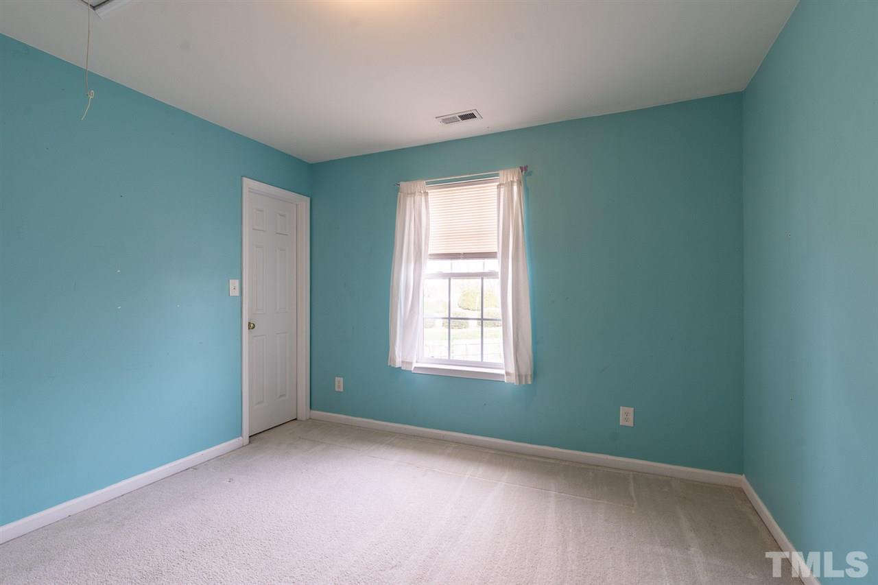 3820 Watkins Ridge Court Raleigh, NC 27616 - Photo 20 of 22 an empty room with a window