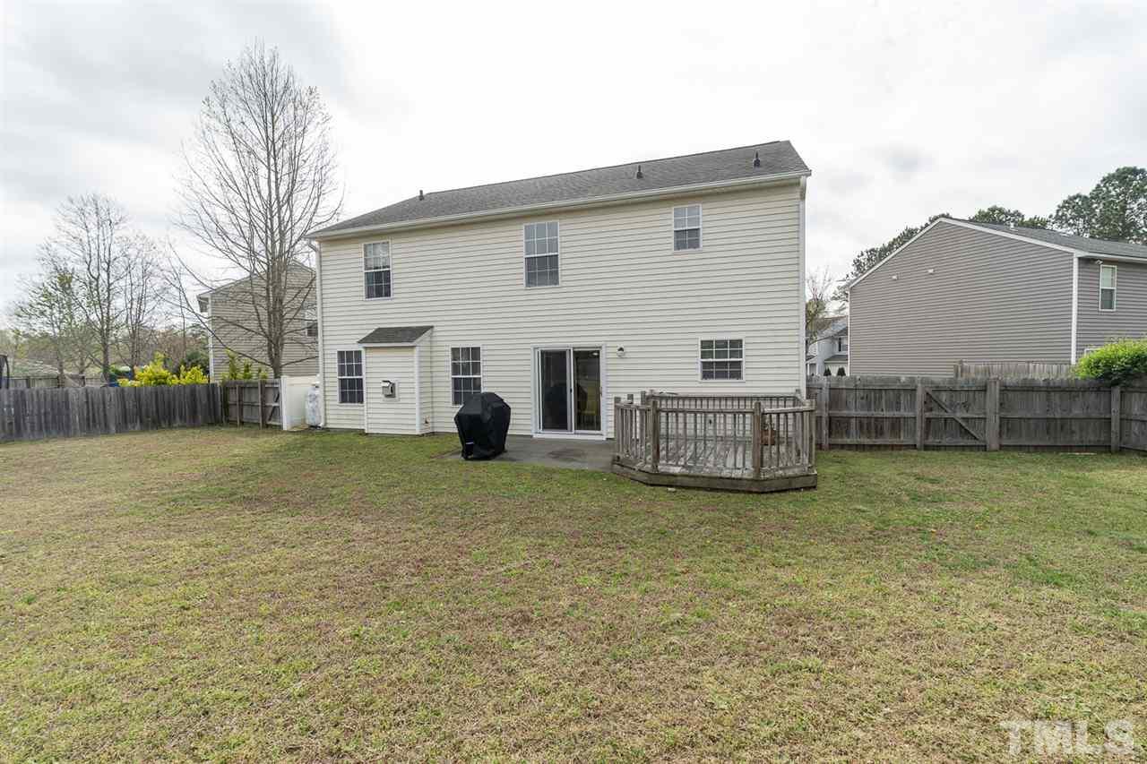 3820 Watkins Ridge Court Raleigh, NC 27616 - Photo 21 of 22 a view of a house with a backyard