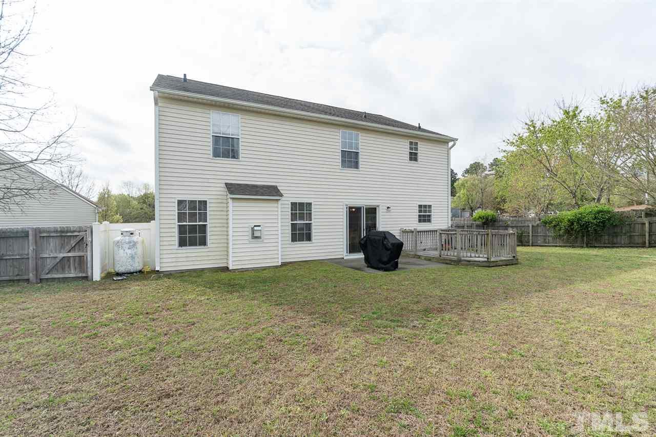 3820 Watkins Ridge Court Raleigh, NC 27616 - Photo 22 of 22 a view of a house with a yard