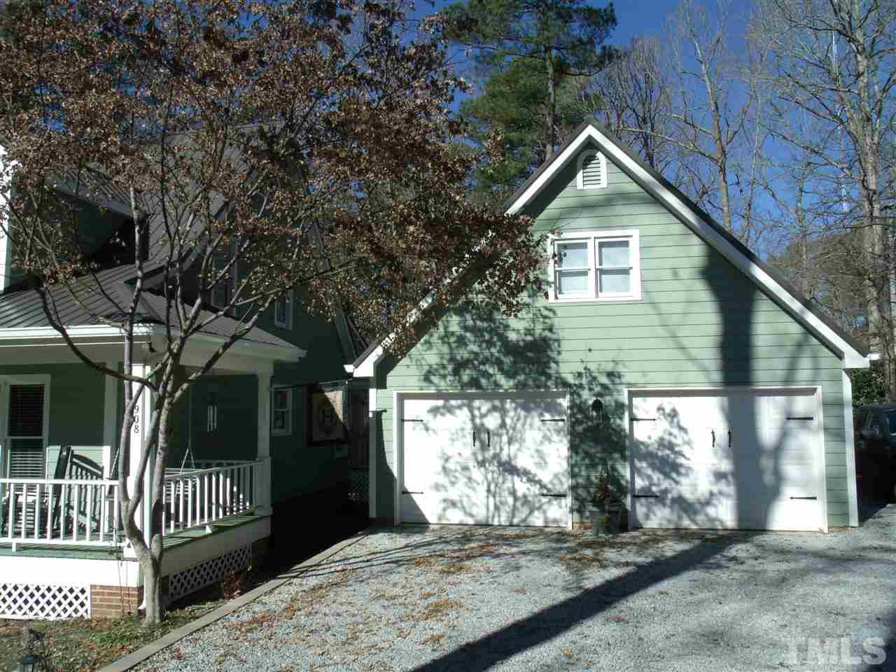 7908 Senter Farm Road Apex, NC 27539 - Photo 3 of 25 Detached garage offers rear entry way and 309 sq feet room above garage garage