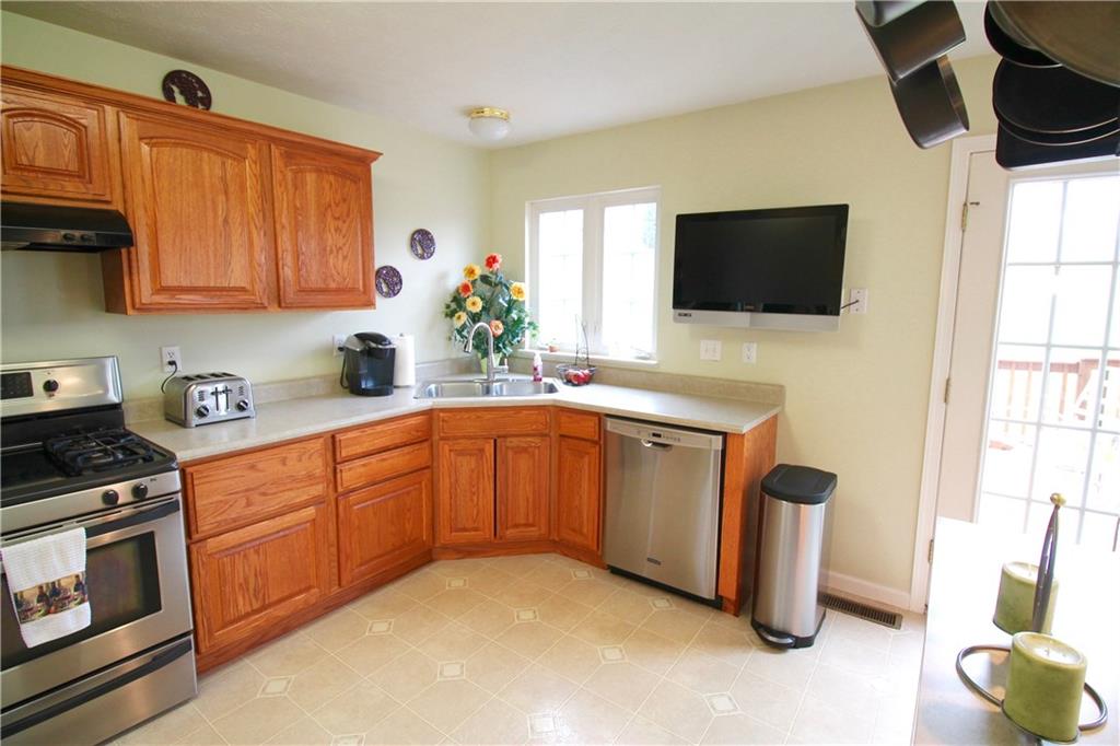 111 Park Place McKees Rocks, PA 15136 - Photo 8 of 23 Spacious kitchen with quick access to the deck.