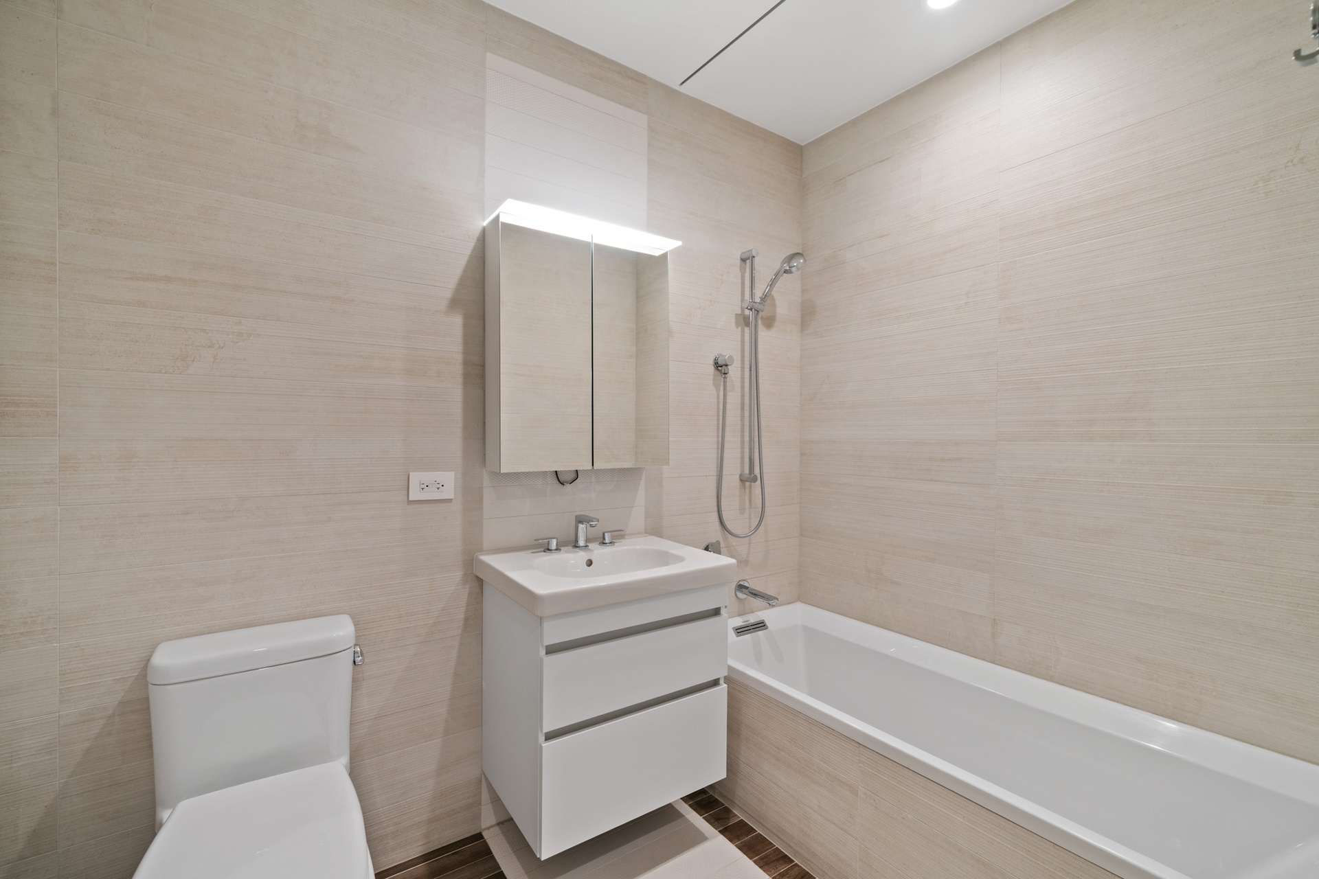 285 West 110th Street, Unit 6B Manhattan, NY 10026 - Photo 12 of 25 a bathroom with a sink a toilet and shower