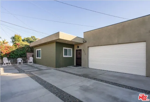 a view of a house with a patio