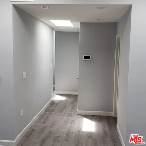 a view of a backyard with furniture