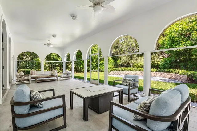 a view of a house with backyard and garden