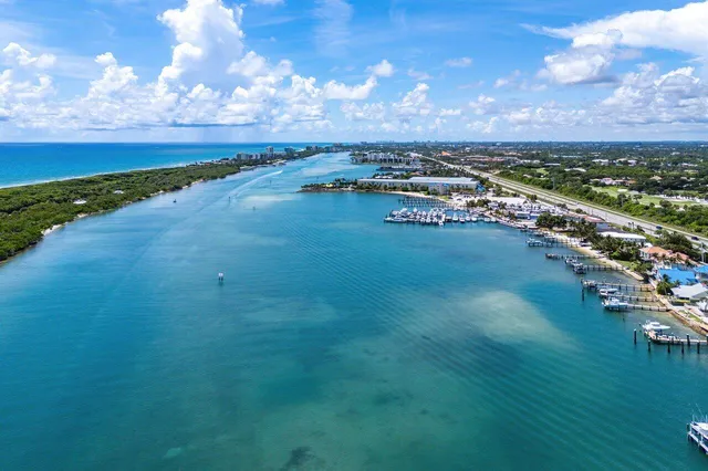 a view of a field with an ocean