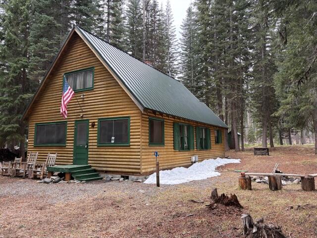 80 Diamond Lake Loop Chemult, OR 97731 - Photo 32 of 36 a view of a house with a yard