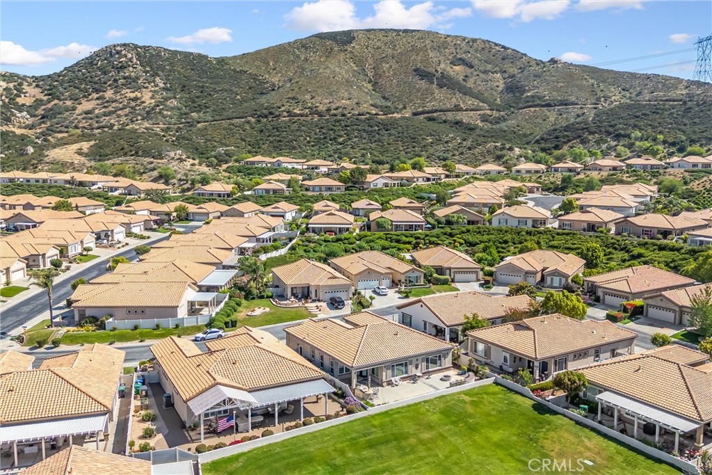 5233 Hampton Road Banning, CA 92220 - Photo 43 of 46 an aerial view of residential houses with outdoor space and trees