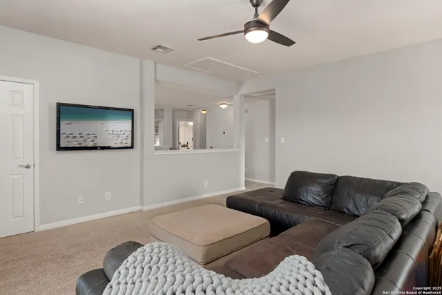 a bedroom with a bed furniture and wall painting