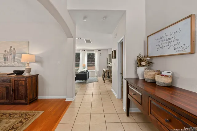 a room with furniture and wooden floor