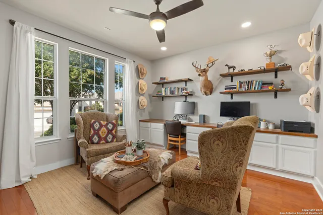 a living room with furniture and a window