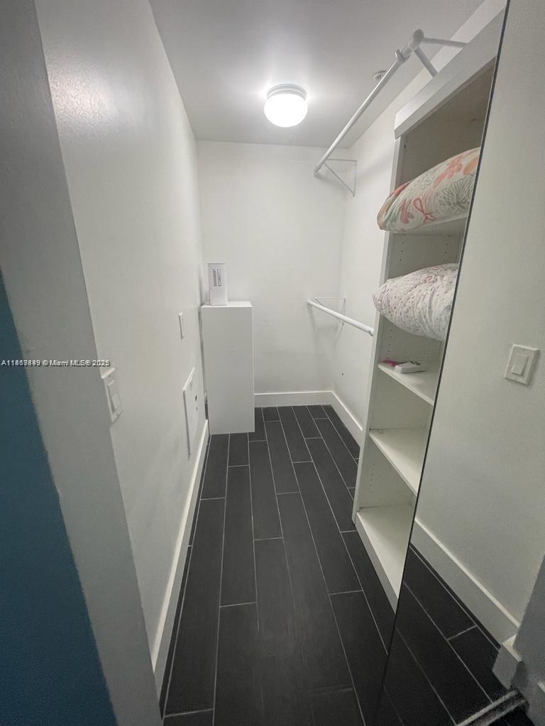 60 Southwest 13th Street, Unit 3606 Miami, FL 33130 - Photo 14 of 22 a view of walk in closet