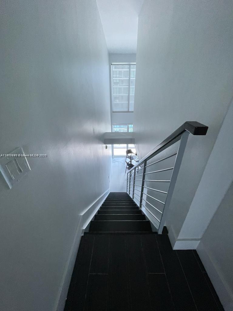 60 Southwest 13th Street, Unit 3606 Miami, FL 33130 - Photo 8 of 22 a view of entryway and hall with a front door