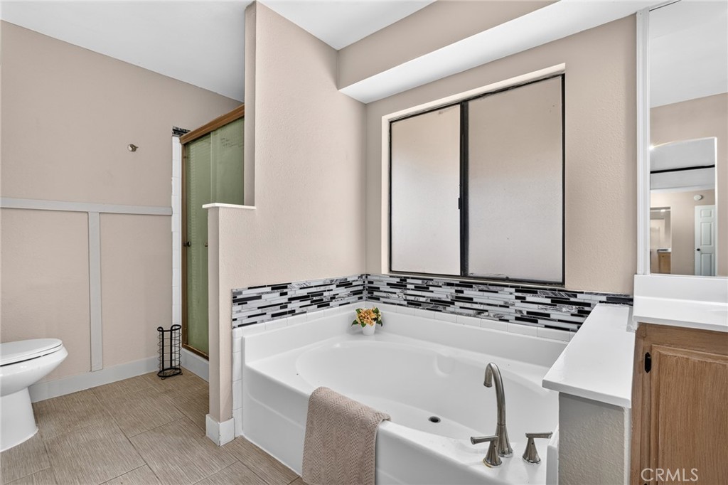 15181 Van Buren, Unit 303 Riverside, CA 92504 - Photo 33 of 42 Primary bedroom bathroom