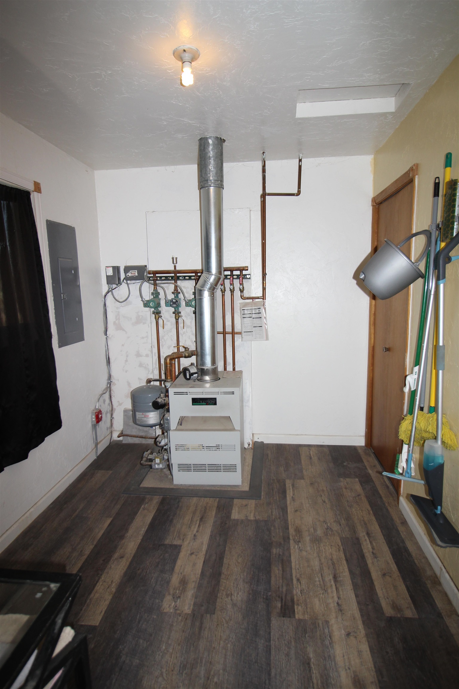 1150 East 7th Street Delta, CO 81416 - Photo 15 of 32 a view of entryway and hall with wooden floor