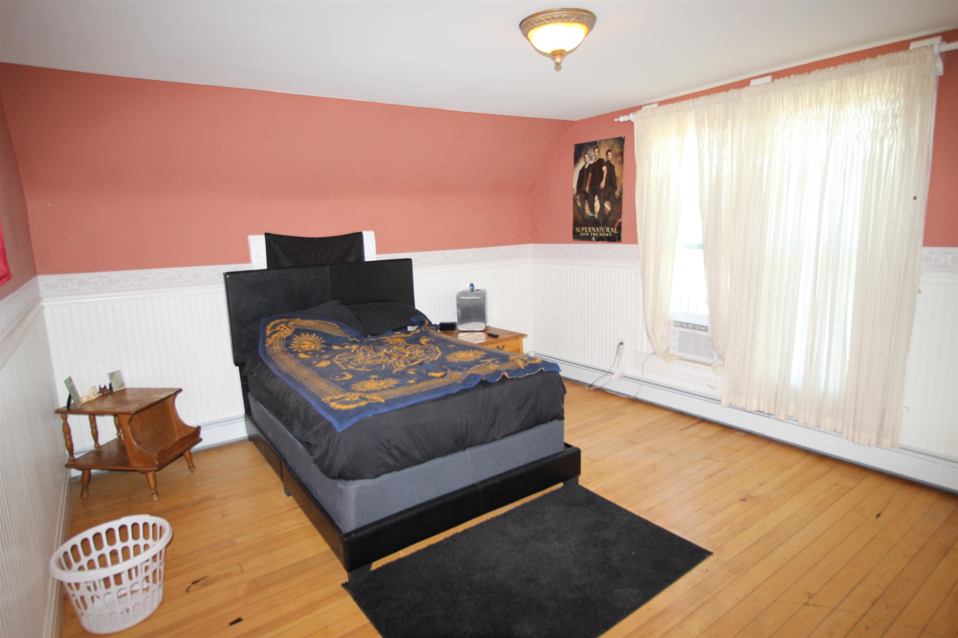 1150 East 7th Street Delta, CO 81416 - Photo 17 of 32 a living room with furniture rug and wooden floor