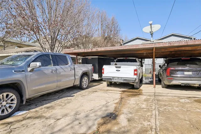 a view of cars parked in a parking lot
