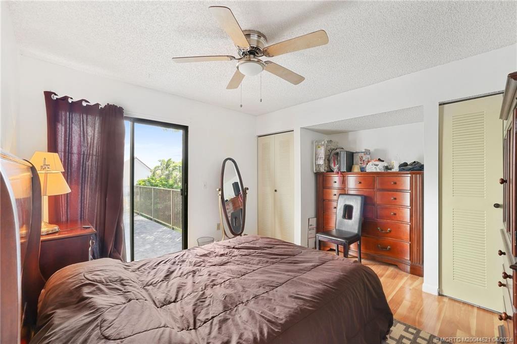 12775 Southwest 110th Terrace Miami, FL 33186 - Photo 22 of 36 a bedroom with a bed and a dresser