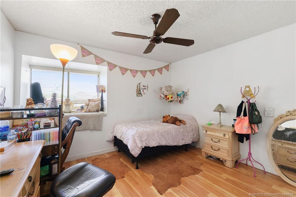 12775 Southwest 110th Terrace Miami, FL 33186 - Photo 23 of 36 a bedroom with furniture and a window