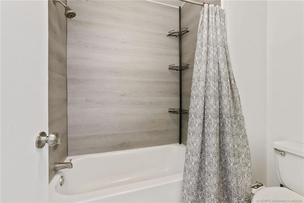 12775 Southwest 110th Terrace Miami, FL 33186 - Photo 25 of 36 a bath tub sitting next to a shower
