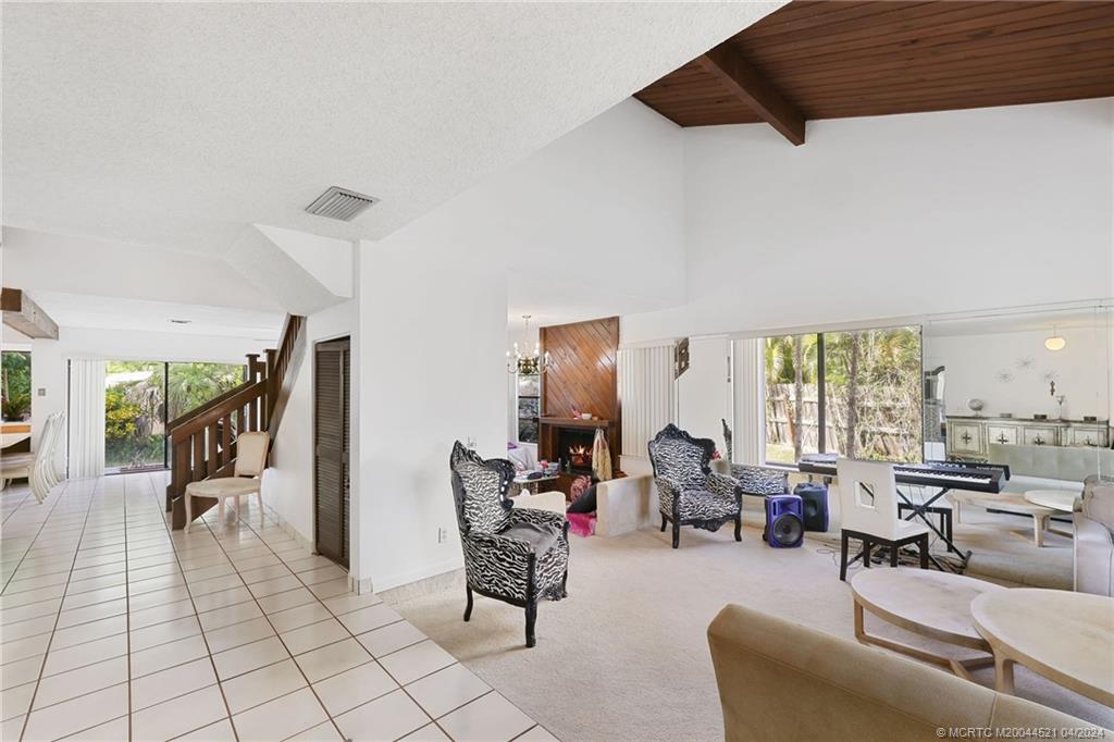 12775 Southwest 110th Terrace Miami, FL 33186 - Photo 3 of 36 a living room with furniture and a large window